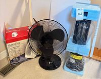 All three items: Honeywell humidifier box, black table fan, Ionic Pro purifier in foam