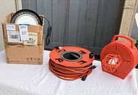 All three items: Snapit2 power reel, cord reel, LED high bay box