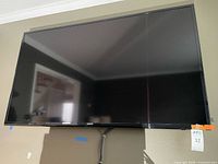Front view of wall-mounted Samsung Series 6 LED TV