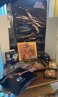Overall lot with poster, Raiders LP, E.T. tray and media