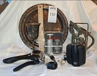 Group shot of all wine accessories with ruler for scale