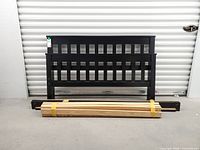 Headboard, footboard, side rails, support slats laid out