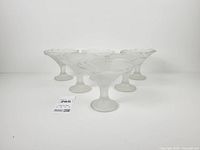 Six frosted glass bowls on white background showing overall design