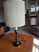 Full view of lamp with shade on table