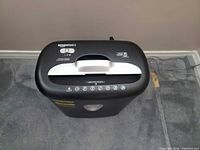 Angled top view showing control slider, handle and feed slot