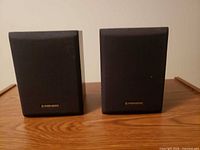 Front view of both Pioneer speakers with grilles