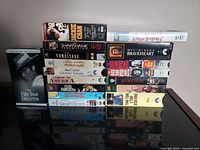 Full view of all VHS tapes standing on table