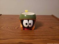 Front view of Marvin the Martian mug showing face and helmet