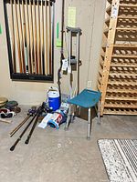 Overview showing bath stool, crutches, canes, Aircast cooler and boxed brace