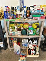 Wide view of shelving with mixed chemical products and accessories