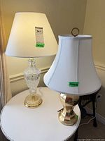 Both table lamps on table showing full view, shades, bases