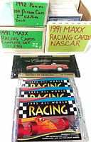 Overview showing labeled boxes, sealed packs and deck