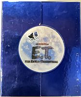Blue foil collector box front with moon and logo