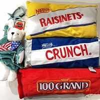 All three candy pillows stacked with NY Teddy bear