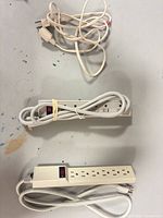 Overview showing two power strips and separate extension cord