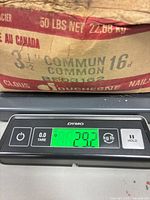 Scale showing box weight 29.2 lb with Duchesne box label 3-1/2" Common 16d