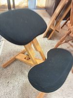 Overall view of kneeling chair showing seat and knee pad