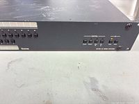 Front right showing control buttons and model labeling