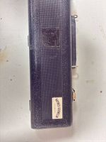 Exterior of black hard case with Haynes-Schweill label