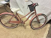 Full side view of bicycle showing color, size and accessories