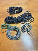 All five coiled cables on table