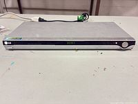 Front view showing LG branding, display and controls