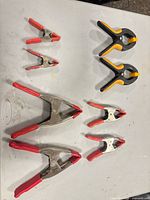 All eight clamps laid out showing sizes and types