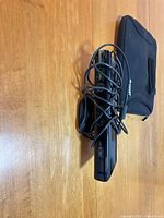 Top view of Kinect sensor with cable coiled and sleeve beneath