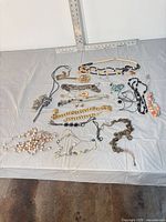 Wide shot of all jewelry pieces arranged on table