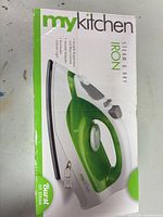 Front of retail box showing brand, model and color of iron