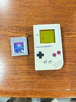 Front view of Game Boy and Tetris cartridge