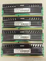 Four Patriot Viper desktop RAM modules laid out showing heat spreaders and labels