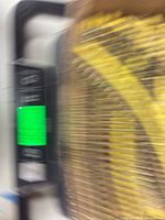 Blurred side shot of box edge with screws