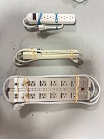 Three bundled power strips showing overall quantity and cords