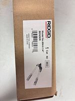 End of box showing Ridgid branding, model 604-II, 1/4" capacity, catalog no. 38033