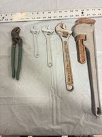 Group shot of all five tools aligned for size reference