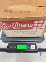 Stelco Nails box on scale reading 17.8 lb