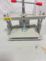 Front angled view showing full Vevor paper press with handles and plates