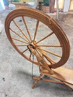Overall view of spinning wheel drive wheel and frame