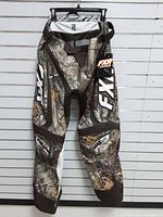 Front view of pants showing size tag at waist and overall design