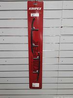 Full packaged set showing both runners on red Kimpex card