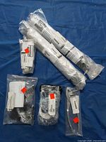 Overview of all six packaged Polaris parts on blue background