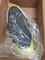 Seat in plastic bag within box