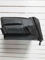 Side view showing molded front panel, Velcro straps, zipper