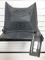 Front view of Polaris rear storage bag showing logo and hang tag