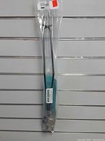 Full view of sealed package containing the pair of ice scratcher bars