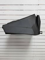 Side view showing triangular profile and fabric material