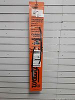 Full view of packaged Woody's carbide runners on hanger card