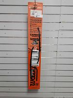 Front of packaged Woody's carbide runners showing full length