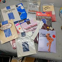 All 15 sealed pantyhose packages displayed on surface